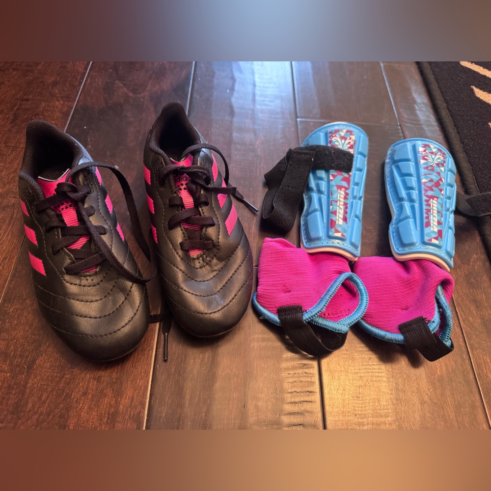 Adidas Black and Pink Kids Soccer Cleats with Pink and Blue Shin Guards
